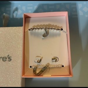 Claire’s sparkly J necklace, bracelet, and earrings